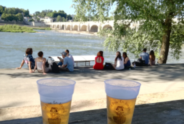 Banks of the Loire river from the Ginguette, a bar-restaurant where you can enjoy food and fresh drinks Banks of the Loire river from the Ginguette, a bar-restaurant where you can enjoy food and fresh drinks